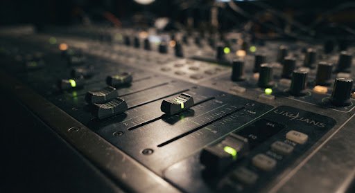 Close-up of a studio audio console